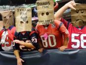 SAD-HOUSTON-TEXANS-FANS-WEARING-BAGS-ON-THEIR-HEADS-e1386305398513